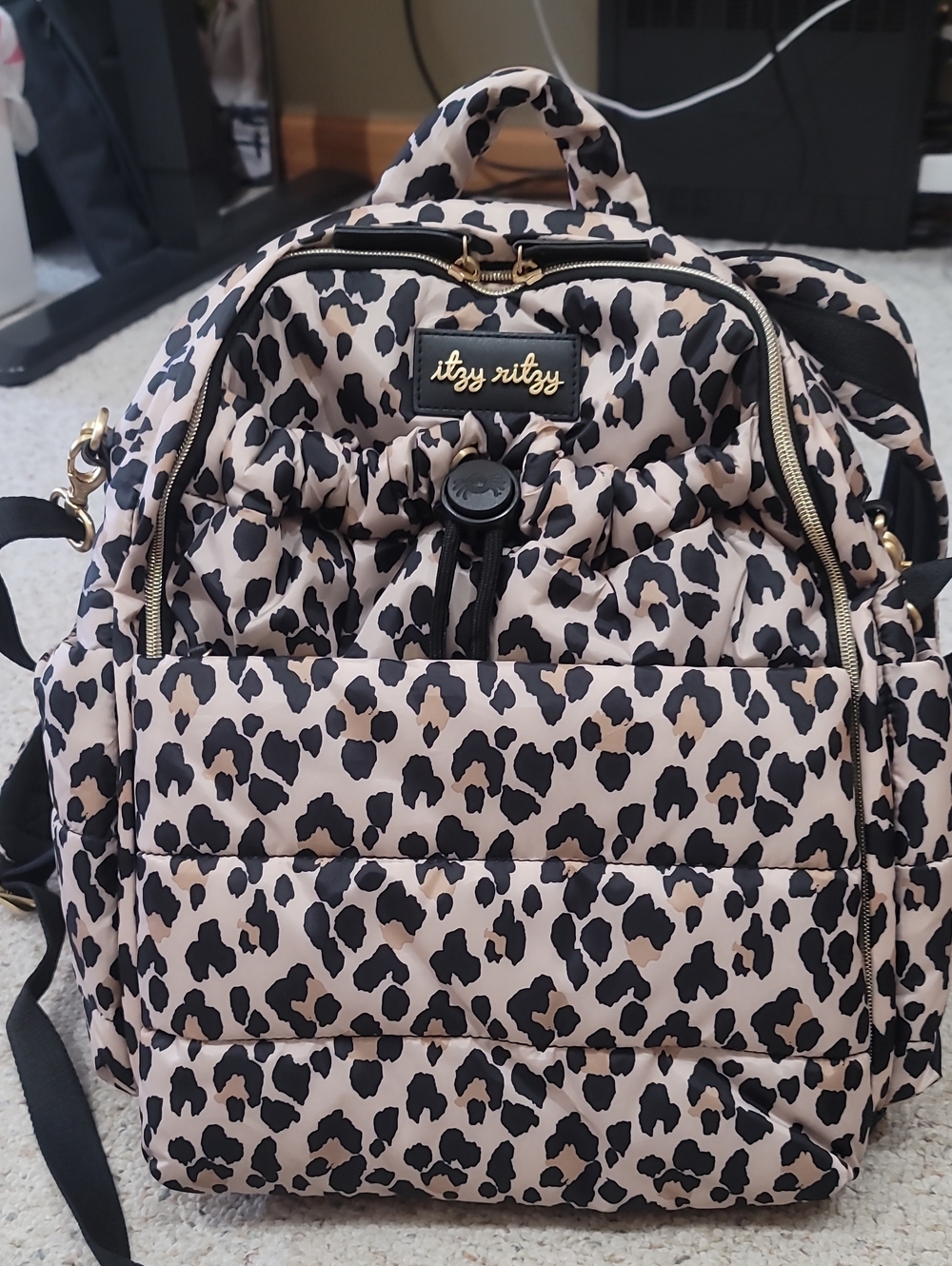 Itzy Ritzy Quilted Leopard-Print Backpack in Black & Cream